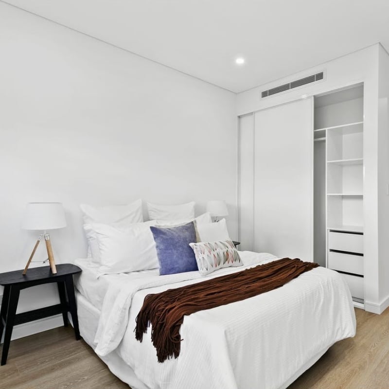 Minimalist bedroom interior at 12 Pillars Place, Matraville—styled and built by Sydney East Building & Renovations.