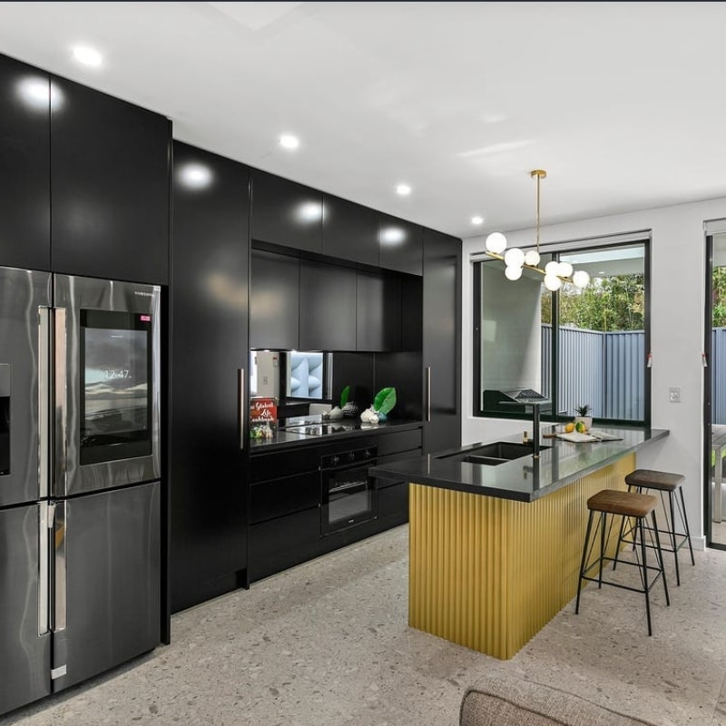 Modern kitchen with sleek counter at 12 Pillars Place, Matraville, completed by Sydney East Building & Renovations.