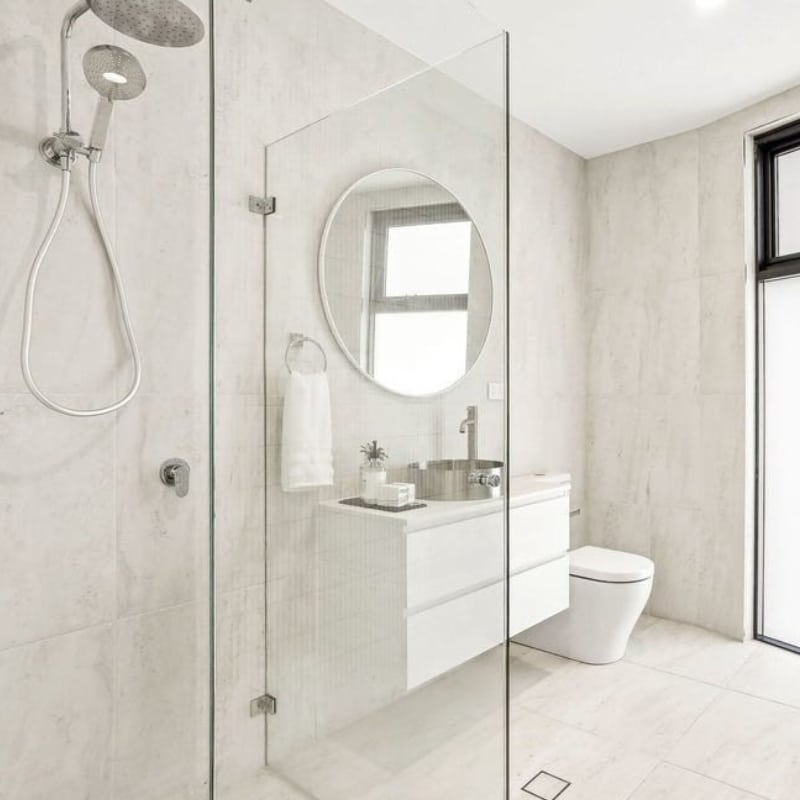 Modern bathroom with contemporary tiles at 55 Eyre Street, Chifley, 2036 – Duplex by Sydney East Building & Renovations.