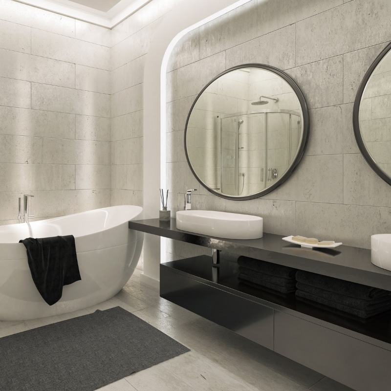 Bathroom renovation with open-plan shower, wall tiles, and LED lighting