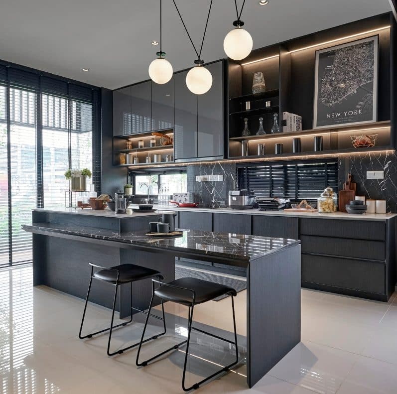 GET TO KNOW US. Built for Life. – Bright modern kitchen with white cabinetry, stainless steel appliances, granite countertops, and a compact dining table