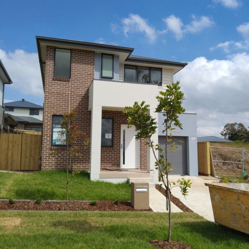 Front shot of a newly renovated brick-type house located at Leppington, by Sydney East Building & Renovations.
