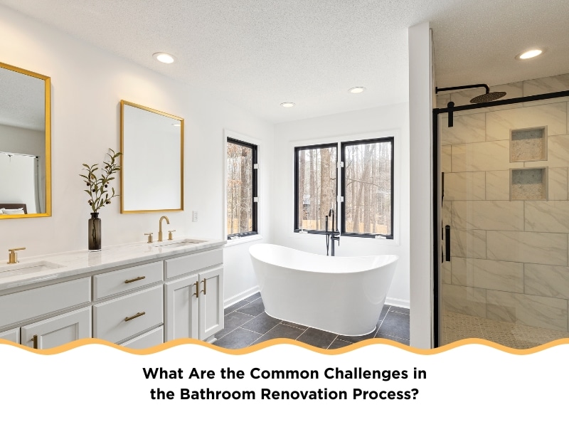 Modern bathroom with vanity, freestanding tub, and glass shower showcasing bathroom renovation process challenges.