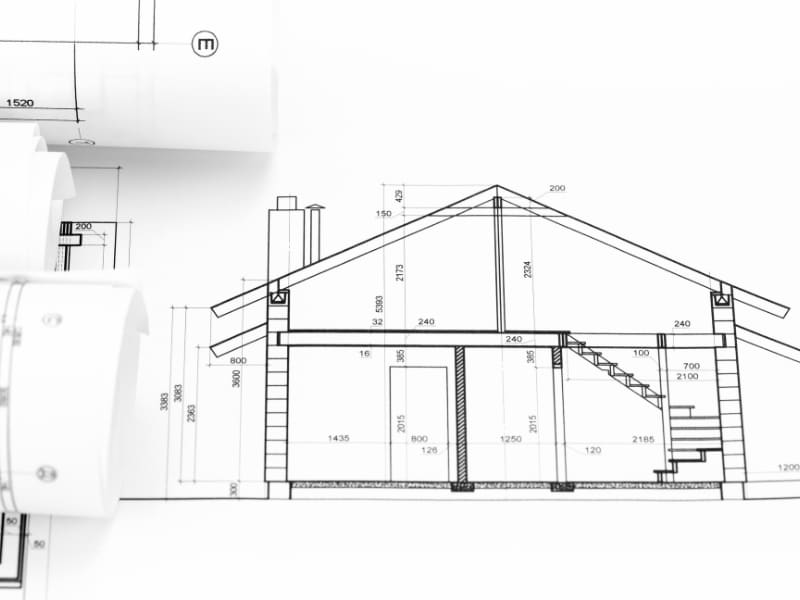 Architectural drawing of a house section with measurements and construction details shown as part of modern house plans.